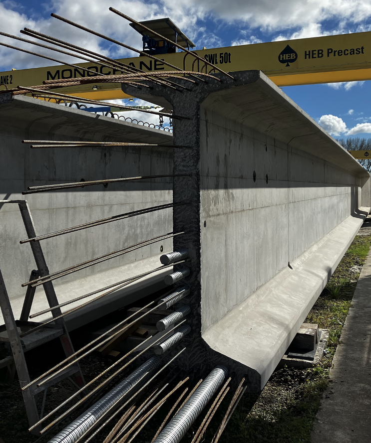 Concrete beam with metal rods